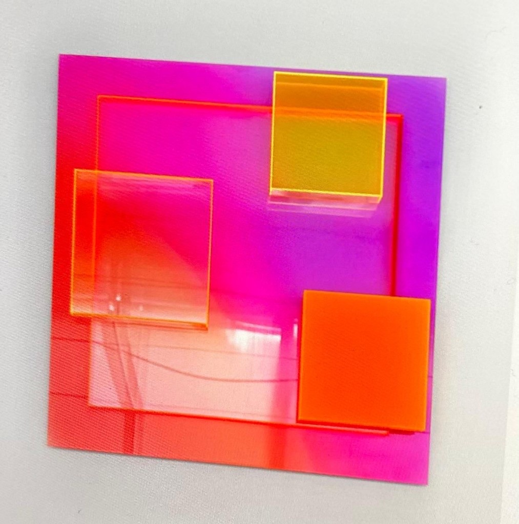 Joséphine square plexiglass artwork with orange, pink and purple translucent layered panels
