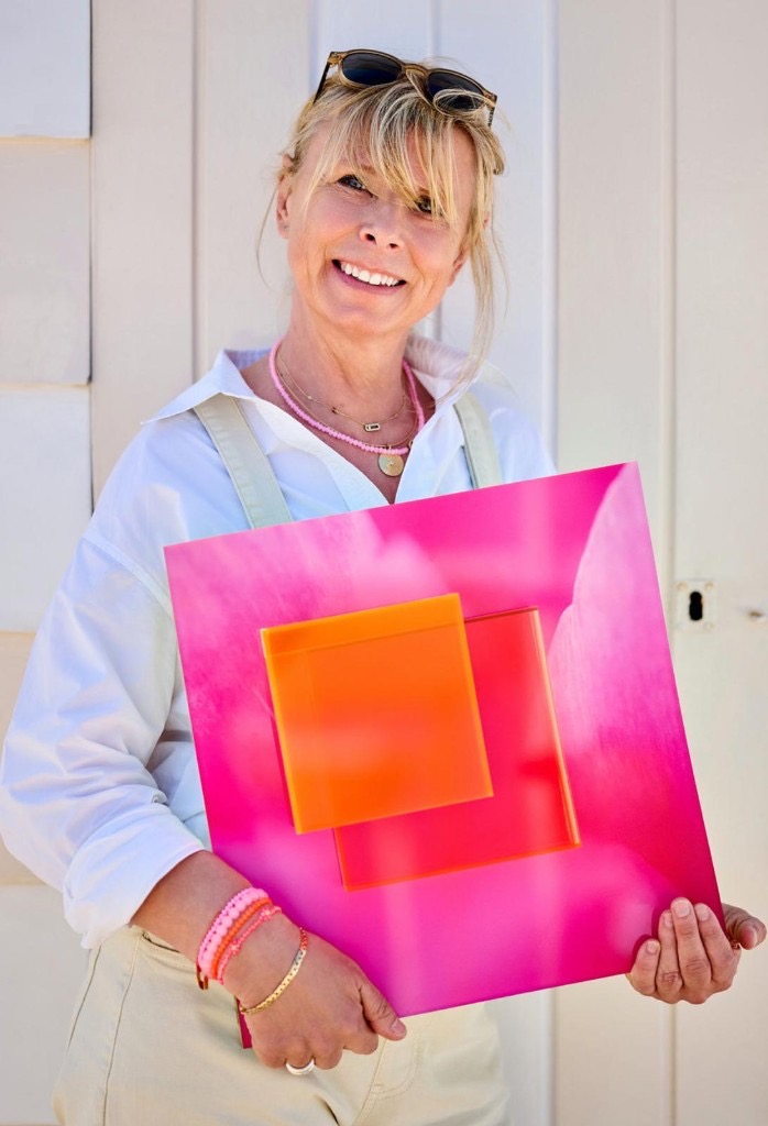 Contemporary artist Joséphine with her luminous plexiglass works at Never Give Up Gallery