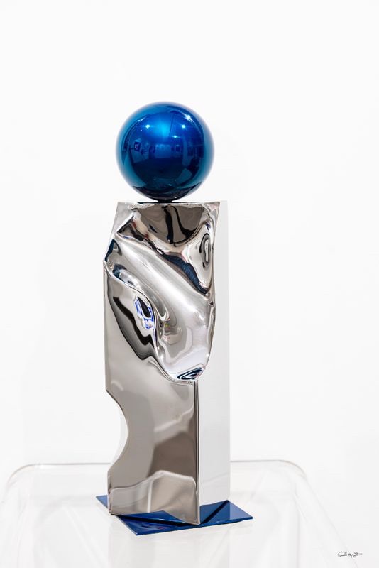 Philippe Gauberti — cobalt blue sphere on crumpled stainless steel pillar